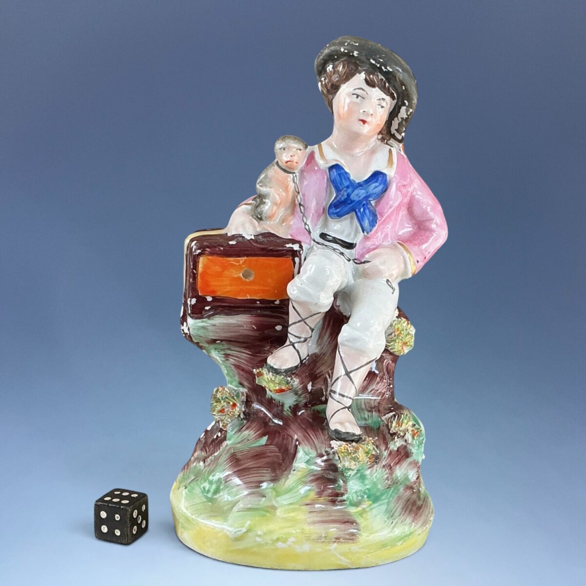 Staffordshire Figure of a Boy With a Performing Monkey