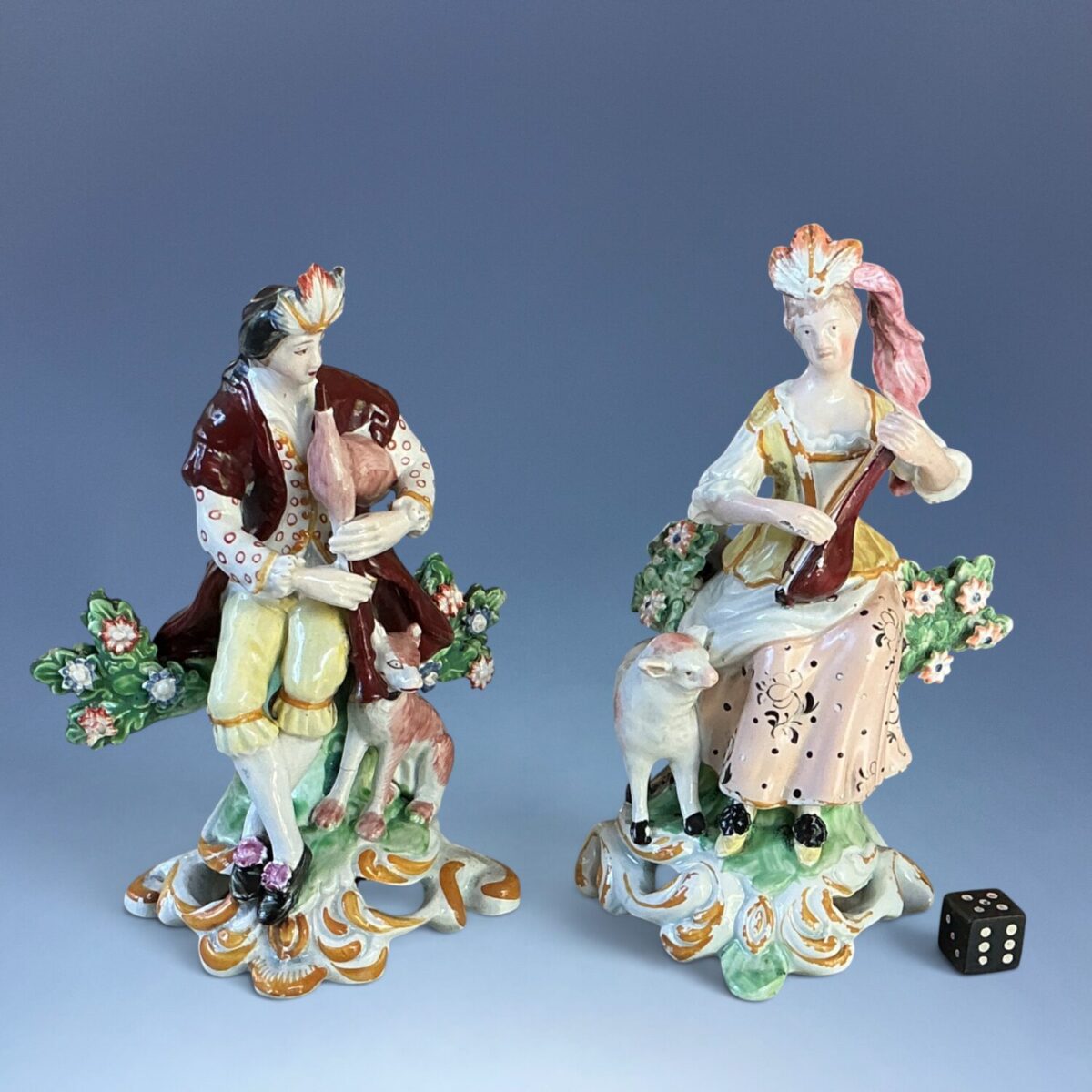 Pair of C19th Staffordshire Pearlware Musician Figures.