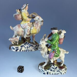 Pair of Staffordshire Pottery 'Welch Tailor & Wife Riding Goats', c1830